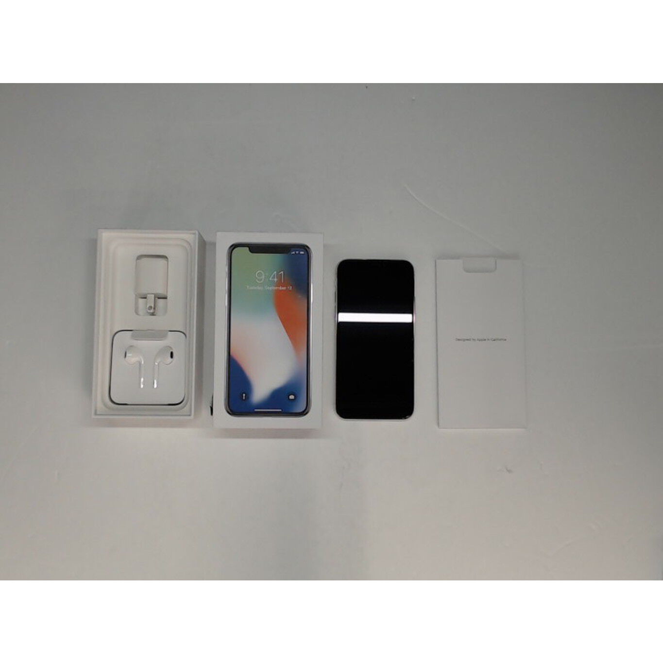 中古 【SIMロック解除済み】【au】 iPhoneX 64GB (シルバー) MQAY2J/A
